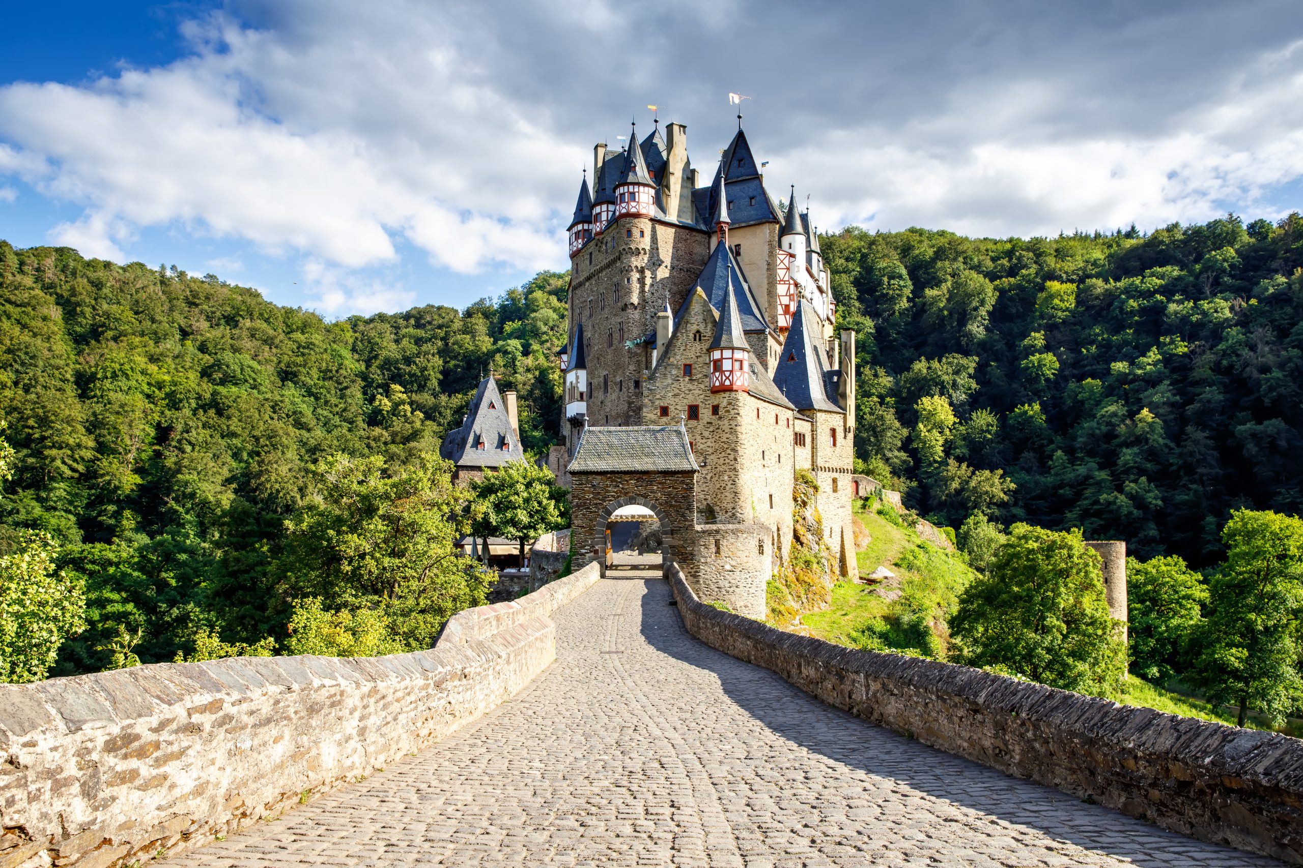 Eltz Castle, a medieval castle located in Germany, Rheinland Pfalz, Mosel region. Beautiful old castle, famous tourist attraction on sunny summer day, empty, without people, nobody.