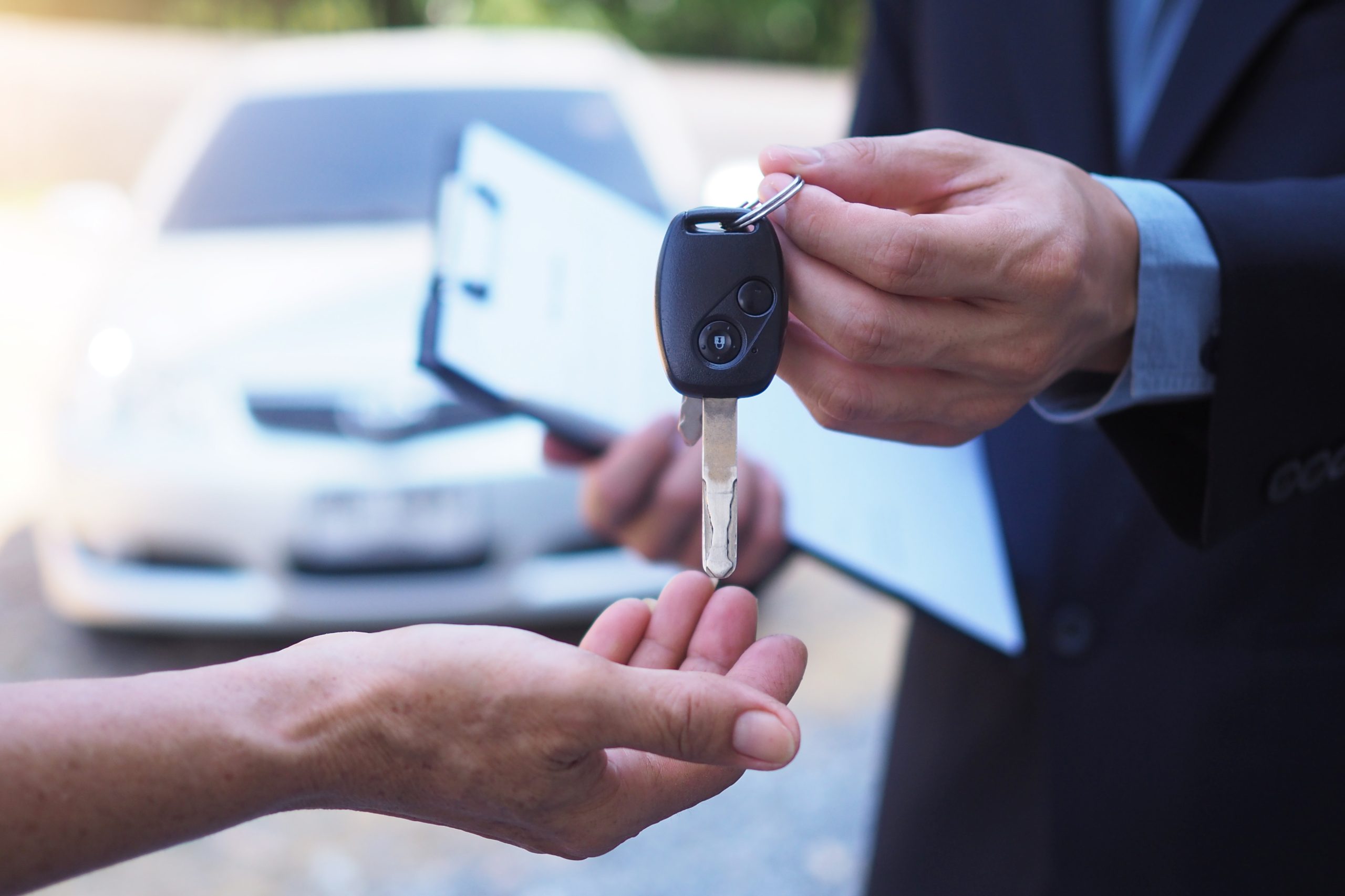 lease, rental car, sell, buy. Dealership manager send car keys to the new owner. Sales, loan credit financial, rent vehicle, insurance, renting, Seller, dealer, installment, car care business
