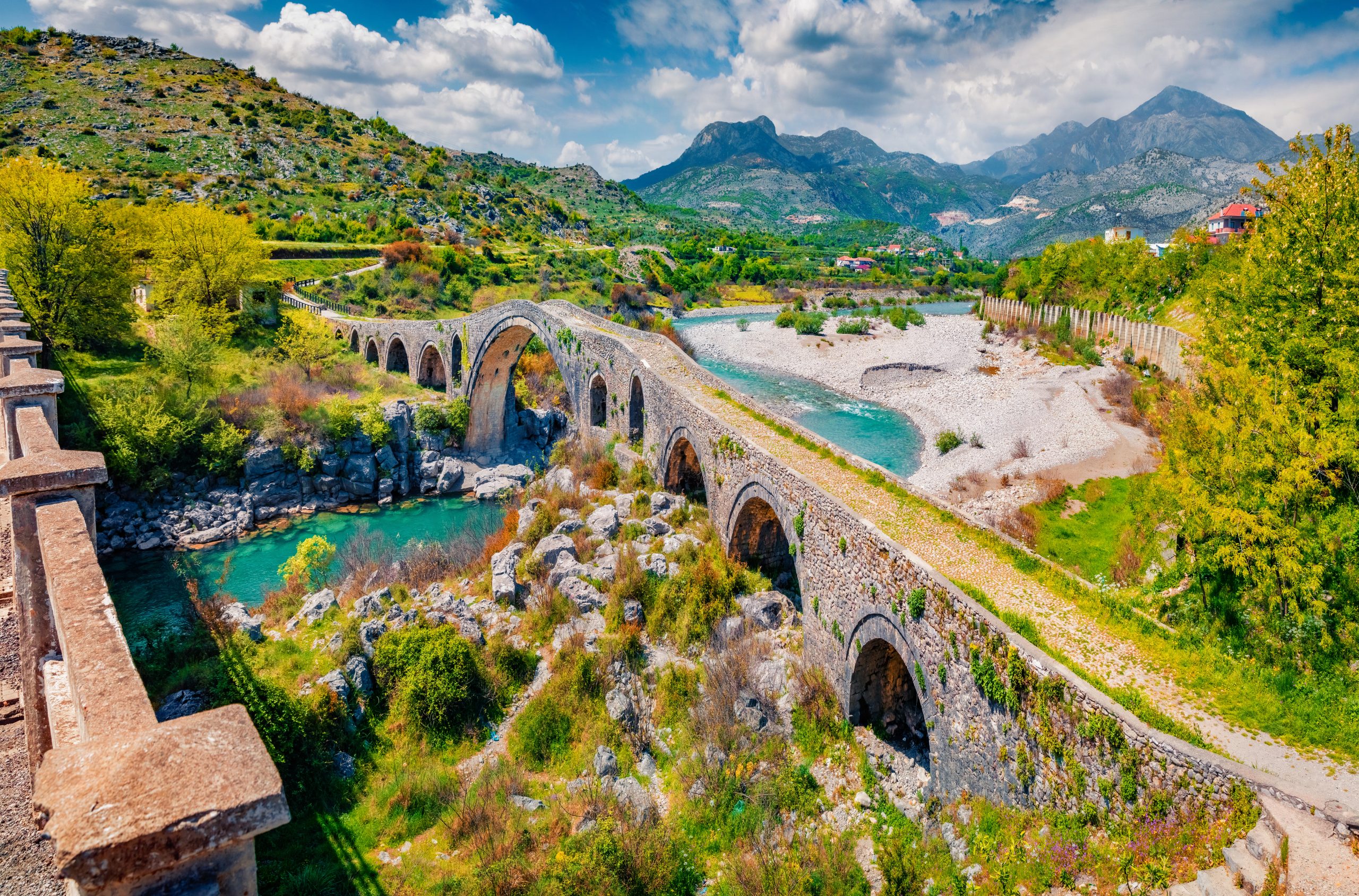 Spectacular spring view of Old Mes Bridge. Wonderful morning landscape of Shkoder. Captivating outdoor scene of Albania, Europe. Traveling concept background.